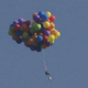 Image for article titled Hero Man Flies Balloon Chair Through the Sky